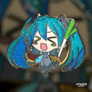 Chibi Hatsune Miku enamel pin with glitter pigtails and glowstick in concert pose