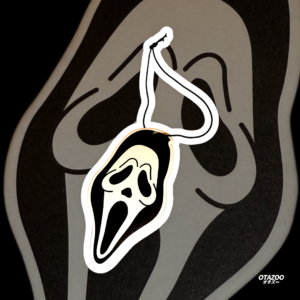 Scary ghostface car decor against dark background