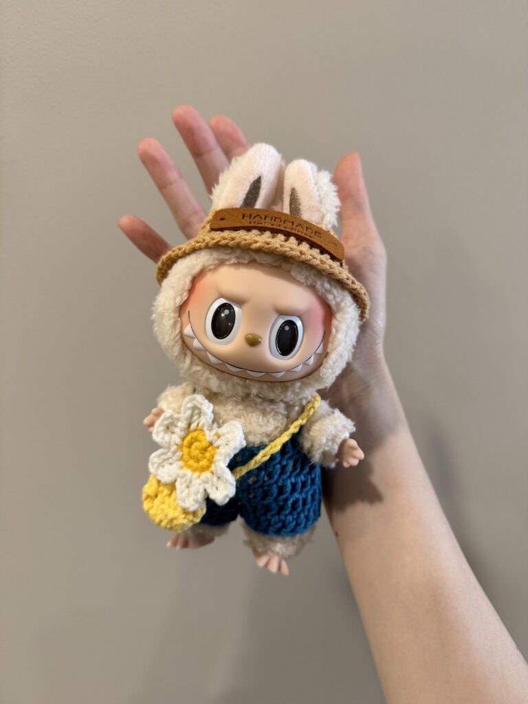 How to Make Labubu Clothes: A Cozy DIY Guide for Fans Who Want More Than Store-Bought 1 Handmade crochet Labubu clothes with yellow flower purse and fluffy hat