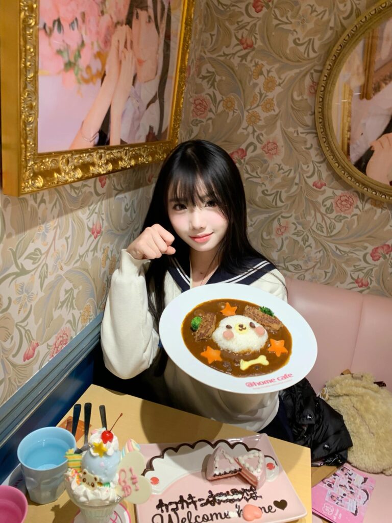 What It’s Really Like at a Maid Cafe in Japan (2025 Experience) 2 Girl showing cute dog-shaped curry dish at a maid cafe in Japan
