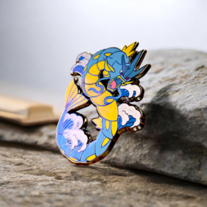 Pokemon enamel pin showing Gyarados posed on a natural rock surface