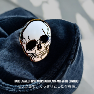 Stylized anatomical enamel pin on hat, showing polished hard finish