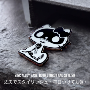 Hello Kitty Skeletor enamel pin showing skeleton design on gray surface