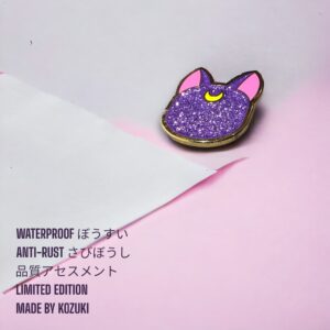 Sailor Moon enamel pin showing Luna in glitter purple angled view on pink background